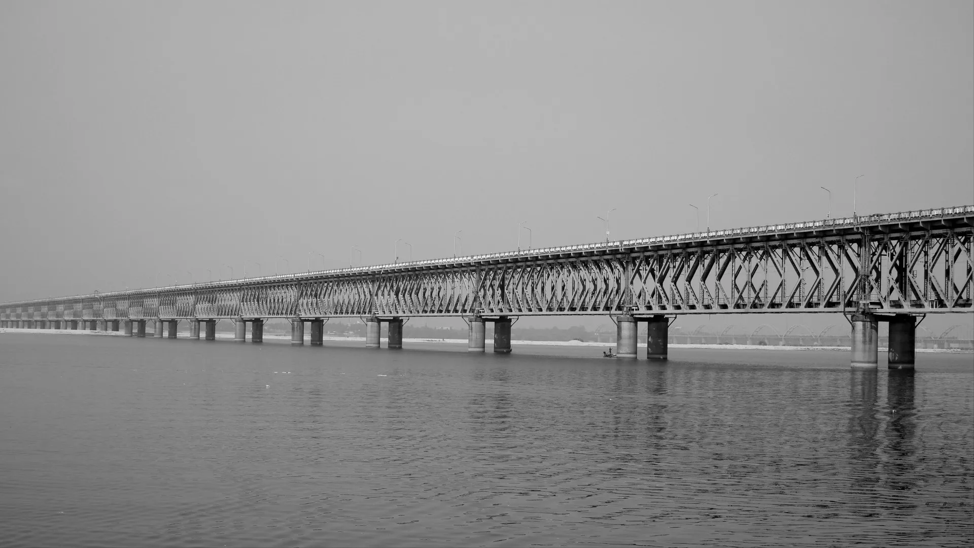 A railway bridge over a large body of water